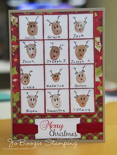 a handmade christmas card with reindeer faces and words on it, sitting on a table