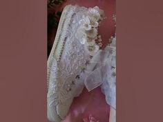 the wedding dress and shoes are on display