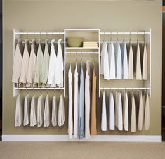 an organized closet with clothes and shoes