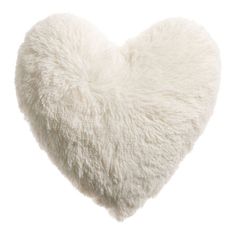 a white heart shaped pillow on a white background