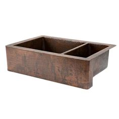 an old wooden sink with two compartments