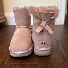 Pink Ugg Bow Boots In Fantastic Gently Used Condition. I Wore These Twice And They Are So Cute, But I Just Don’t Wear Them Much Because I Live In Hot Climate. They Are A 6 But Run Big. I Wear A 6.5 And They Fit Perfectly. Pink Bow Uggs Aesthetic, Ugg Bow Boots, Ugg Bow, Uggs Bow Pink, Pink Bailey Bow Uggs, Pink Ugg Boots Zappos, Pink Ugg Boots With Bows, Ugg Boots With Bows, Cute Uggs