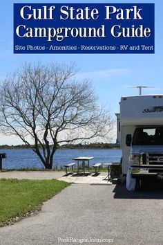 an rv parked next to a lake with the words gulf state park campground guide