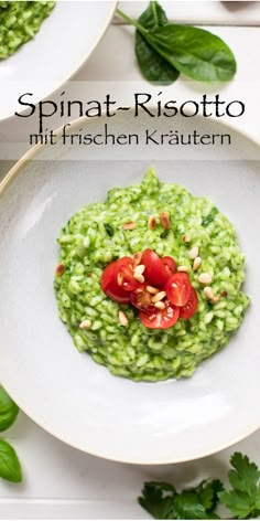 spinach risotto with tomatoes and pine nuts in a white bowl on a table