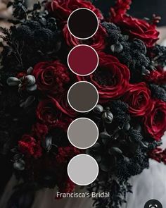 a bridal bouquet with red roses and black foliage in the center, surrounded by three different shades of gray