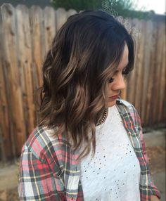 Perfect Caramel balayage highlights, dark brown root on short hair and a beach wave style