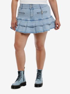 Add some charm to your look with this denim skirt! It features two tiers of pleats with a wide yoke and 3 buttons  plus zippered front pockets and a detachable cluster of charms. 98% cotton; 2% spandexWash cold; dry flatLength: 17"Stretchy materialDetachable charm includedImportedModel is 5'10"Model wears size 1 Hot Topic Skirts, Social Collision, Denim Pleated Skirt, Plus Size Hot, Hello Kitty House, Disney Dragon, Blue Beetle, The Big Lebowski, Retro Tv