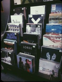 there are many cds on display in the store