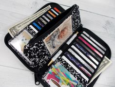 The ULTIMATE EXTRA Large Zip Around Wallet makes room for ALL of your wallet essentials and more!   🥰  This item is made to order for you in the fabric of your choice 📏 Wallet Measures 7.5 inches Long By 4.75 inches Tall 📝  Item Features: -4 Interior Slip Pockets {fits cash, receipts, passport, etc.} -18 Credit Card Slots   -3 Clear ID Slots -Center Coin Pouch -Pen Loop  -1 D-Ring [the wallet will include two d-rings when crossbody strap is purchased] -INCLUDES Detachable wrist strap measures 6" long or 12" in diameter - made with exterior fabric selection If you choose the 'add crossbody strap', you will receive a wrist strap AND crossbody strap ℹ️  ORDERING PROCESS  ℹ️ * You are welcome to contact me prior to purchasing this item if you would like assistance with the fabric selection Wallet Essentials, Womens Clutch, Photo Sleeve, Handmade Birthday Gifts, Womens Wallet, Custom Wallet, Handmade Purses, Large Wallet, Look Older