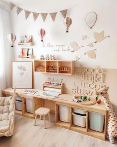 a child's playroom with toys and decor