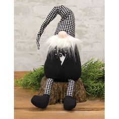 Black & White Buffalo Check Tuxedo Gnome is sand-weighted and features a black tuxedo with aback antiwhite gingham hat, matching legs, and bowtie. Gnome has long, dangling legs that look great hanging from a stool, riser, or tabletop and its hat is wired for desired adjustments. Measures 11.5" high by 5" wide. Trinx | Trinx Claye Tuxedo Gnome 11.5 H x 5.0 W x 5.5 D in black / brown / gray / whiteFabric in Black / White | 11.5" H X 5" W X 5.5" D | Wayfair | Home Decor Black And White Gingham, Black Tuxedo, White Buffalo, Buffalo Check, Gingham, Brown And Grey, Tulle Skirt, Buffalo, Looks Great