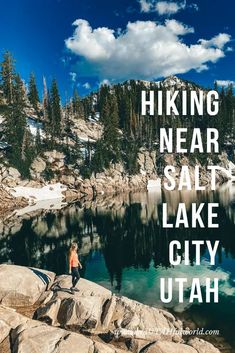 a person standing on top of a mountain next to a lake with the words hiking near salt lake city utah