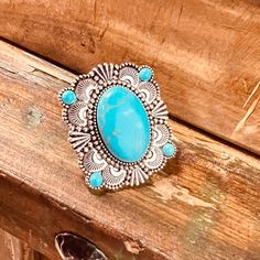 My Turquoise Terrain Ring is a Western Concho Style cuff ring. The ring is 2" in Diameter. It is super light weight and can be adjusted to fit any size finger. Super Cute!! The beautiful Concho Style with the large turquoise stone in the center and the 4 tutquoise small stones on each corner. Cuff Ring, Cuff Rings, The Ring, Turquoise Stone, The 4, Super Cute, Cuff, Turquoise, Stone