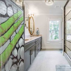 the bathroom is decorated in white and green