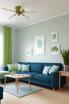 a living room with blue couches and green curtains