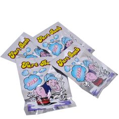 four bags of candy with cartoon characters on them