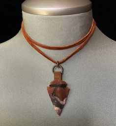 Arrowhead! Arrowhead Necklace! This Brazilian, raw stone arrowhead has been wrapped with fine waxed leather and then attached to a double, genuine leather cord.... I have added a 4" extension chain to the back clasp allowing it to be completely adjustable.... I have also added an antique bronze feather charm to the end of the chain.... This is the perfect gift for men and women....a little bit bohemian it can be worn all year round....! Please select if you would like this item gift wrapped....I Bohemian Brown Arrowhead Jewelry, Bohemian Brown Arrowhead Necklace, Rustic Handmade Arrowhead Necklace, Brown Arrowhead Necklace For Gift, Arrowhead Jewelry, Arrowheads Jewelry, Arrowhead Necklace, Painted Ornaments, Feather Charms