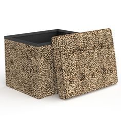 an animal print box is shown with the lid open and it's bottom half closed