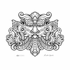 an intricate mask with ornate designs on the front and back, in black and white