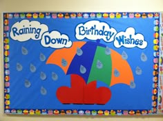 a bulletin board with the words raining down and an umbrella in the rain on it