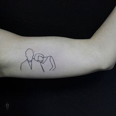 a man and woman tattoo on the arm