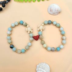 Beautiful Amazonite Crystal Beaded Turtle Heart Matching Bracelets. Excellent As A Unique Gift For Best Friends, Mom And Daughter, Sisters, Grandma And Granddaughter Or Anyone Special You Love. These Lovely Couple Heart Bracelet Are Made With High Quality Materials Decorated With Lots Of 14k Gold Spacer Beads (Tarnish And Water Resistant) Bracelet Size Is Around 6.5 Inches. It Is Made Stretchy So It Can Fit From 6" To 7" If You Have Any Question Please Feel Free To Ask I Will Respond As Soon As Heart-shaped Beaded Bracelets With Natural Stones For Gift, Heart-shaped Natural Stone Beaded Bracelets For Gifts, Heart-shaped Natural Stone Beaded Bracelets As Gift, Heart-shaped Natural Stone Beaded Bracelet Gift, Turquoise Heart-shaped Beaded Bracelets, Turquoise Heart-shaped Beaded Bracelet, Blue Heart-shaped Beaded Bracelets, Blue Heart-shaped Beaded Bracelet, Handmade Turquoise Heart Bracelet As A Gift