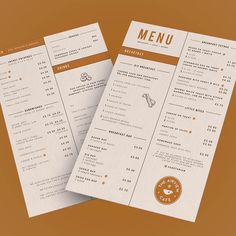 two white and brown menus on top of each other