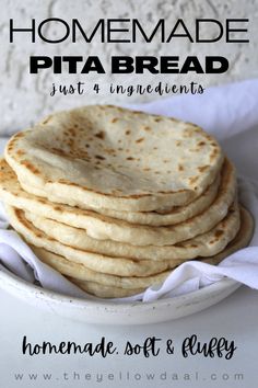 homemade pita bread in a white bowl with text overlay that reads homemade pita bread just 4 ingredients