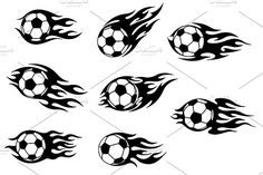 a set of soccer balls with flames