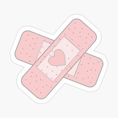 two pink bandages with a heart sticker