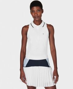 Our new performance top for days on the court. Sweat-wicking, anti-bacterial fabric keeps you cool and dry. Loose fit with classic polo collar and half zip. Mesh panel at the back for extra breathability. Flattering seamline details. Front length: 51cm / 20". Model wears size S and is 178cm/5'10" tall. Style Code: SB9291Colour: White Tennis Tank Tops, Match Point, Pickle Ball, Running Leggings, Sweaty Betty, Vest White, Mesh Panel, Performance Outfit, Polo Collar