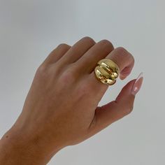 Gold Chunky Dome Ring - Crafted from gold and stainless steel, our bubble gold dome ring. The smooth reflective surface looks absolutely stunning and makes an incredible statement!  Details: - Stainless Steel and 18k Gold - Hypoallergenic - non-tarnishing - Will not turn skin green! - Style: Minimalist WHY VASI Jewelry? - Ethically sourced gems and stones - Made with recycled gold - Handmade or designed/sourced - Shop local (based in Chicago) - Beats major competitors prices  - Long lasting qual Trendy Everyday Dome Ring, Modern Wide Band Round Metal Ring, Modern Wide Band Metal Ring, Modern Wide Band Ring In Metal, Modern Tarnish-resistant Dome Ring For Everyday Wear, Modern Everyday Tarnish Resistant Dome Ring, Minimalist Metal Dome Ring With Open Design, Minimalist Metal Dome Ring With Open Shape, Modern Metal Dome Ring With Polished Finish