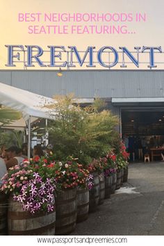 there is a sign that says best neighborhood in seattle featuring firemontt and flowers