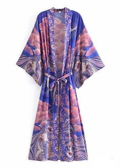 Discover Boho Elegance with the Purple Long Kimono Featuring an Original Print Enter the world of boho fashion with the elegant purple boho long kimono with original print, the perfect addition to any fashion-conscious woman's wardrobe. This kimono features a unique and intricate print in beautiful shades of purple, exuding boho charm and style. The loose, flowing fit ensures maximum comfort for all body types, while the lightweight, breathable fabric offers a relaxed, carefree feel. The origina Moda Kimono, Boho Robes, Kimono Outerwear, Boho Styl, Boho Mode, Kimono Shirt, Mode Kimono, Belted Robe, Bohemian Kimono