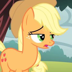 a pony with blonde hair and green eyes looking to the side while standing in front of trees