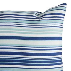 a blue and white striped pillow on a white background