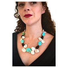 Bold statement necklace of richly colored Kingman turquoise slabs interspersed with chunky tumbled tourmaline beads and very large baroque Keshi fan pearls. The necklace terminates in a lovely finely detailed box clasp set with turquoise in oxidized sterling silver. Fabulous with almost anything from a tee shirt to cocktail attire. Length: 18” Style: Modern, contemporary Chunky Turquoise Necklace, Bold Statement Necklaces, Kesha, Cocktail Attire, Tourmaline Beads, Kingman Turquoise, Oxidized Sterling Silver, Baroque Pearls, Tourmaline