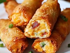 Mini Jalapeno Popper Egg Rolls combine the bold, creamy flavors of classic jalapeno poppers with the crispy, golden texture ... Read more Best Orderves Party Appetizers, Game Day Egg Rolls, Spicy Jalapeño Egg Rolls, Dinner Bites Ideas, Bacon Jalepeno Popper Egg Roll, Bacon Jalapeno Poppers Eggrolls, Jalapeño Wonton Poppers, Bacon Jalapeño Egg Rolls, Mini Egg Rolls Appetizers