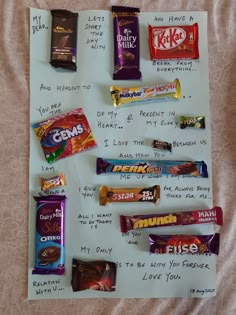 a bulletin board with candy bars on it