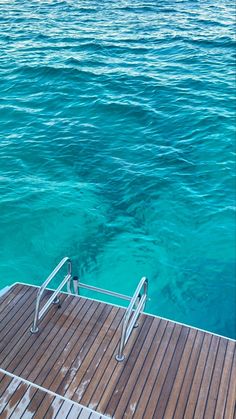 the deck of a boat that is in the water