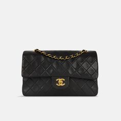 This stunning and iconic piece from Chanel is an absolute must-have for any woman with a love for all things Chanel. Featuring an eye-catching double C logo in gold, this classic flap bag is sure to make heads turn wherever you go. Given their timeless design and exquisite craftsmanship, classic flaps make amazing investment pieces as they rarely cease to lose their value. SPL Exterior Black quilted lambskin leather 24k gold-plated hardware Interwoven chain and leather strap Turn lock closure Slip pocket at rear of bag 1994 - 1996 production Great vintage condition - some scratches under front flap / some rubbing to corners Interior Burgundy lambskin Double flap CC stitched logo on flap Chanel stamp embossed in leather Two slip pockets Great vintage - some white scratches and marks / sligh Chanel Vintage Classic Flap, Classic Flap Chanel, Chanel Vintage Bag, Collage Items, Chanel Bag Classic, Wag Dr, F1 Wag, Chanel Classic Flap Bag, Vintage Chanel Bag