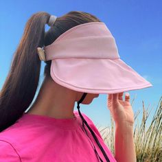 FREE Standard U.S Shipping on all orders over $35 Women's Sun Hat Ponytail - Wide Brim Bucket Hat with Ponytail Hole - Trendy Open Top Summer Hat - Perfect for Stylish Beach Looks 💕 These summer hats women are made of 100% cotton fabric, lightweight, breathable and comfortable to wear. Foldable Pony Tail Hat: packable and will fit your handbag when not in use, so you can bring this ponytail beach hat everywhere with you. Ponytail sun hat comes with removable wind proof rope / chin strap for win Trendy Adjustable Visor Hats, Adjustable Brimmed Baseball Cap With Uv Protection, Adjustable Brimmed Visor For Outdoor Activities, Adjustable Solid Color Brimmed Baseball Cap, Trendy Sun Hat Visor One Size Fits Most, Brimmed Bucket Hat For Outdoor Activities, Adjustable Pink Hat For Outdoor Activities, Spring Baseball Cap With Adjustable Visor, Pink Brimmed Sun Hat For Outdoor Activities