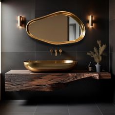 a bathroom with a sink, mirror and lights on the wall in black and gold colors