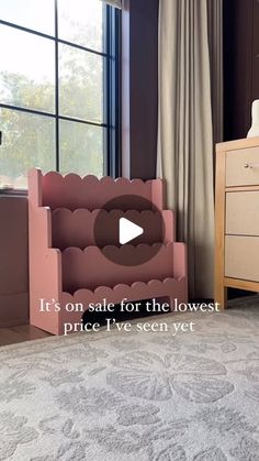 a bedroom scene with focus on the bed and dresser in the foreground text reads it's on sale for the lowest price i've seen yet