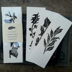 four different types of leaf stencils are on display in a box next to each other