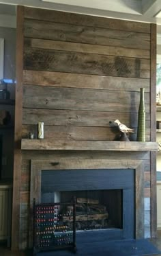 a living room filled with furniture and a fire place in the middle of a room