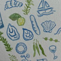 an image of watercolors on paper with blue and green items in the background