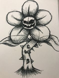 a black and white drawing of a flower