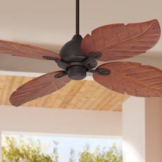 a ceiling fan with two leaves on it