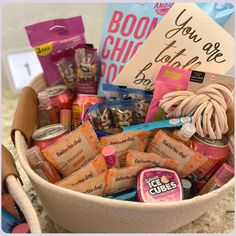 a basket filled with lots of goodies on top of a table